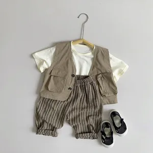 Three-piece boy cargo vest outfit including white T-shirt and striped trousers