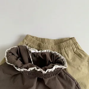 Pantalons décontractés enfants en coton kaki et marron avec taille élastique et poches