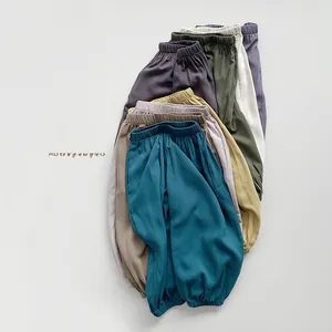 Close-up of elastic waistband on lightweight breathable mosquito pants for kids