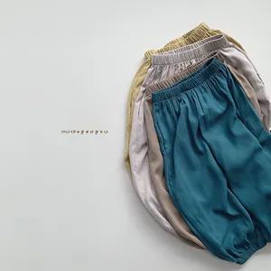 Detailed close-up of breathable cotton linen anti-mosquito trousers for kids in four soft colors