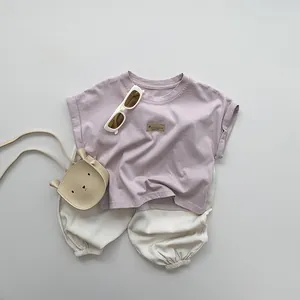Kids lavender t-shirt and off-white jogger set with bear bag and summer badge