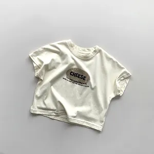 Flat lay of cream cotton kids t-shirt with retro Cheese print and round neckline