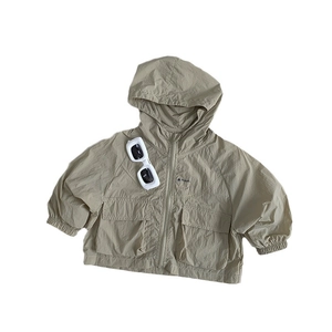 Light brown hooded sun protection jacket for kids with front pockets and Plant. logo