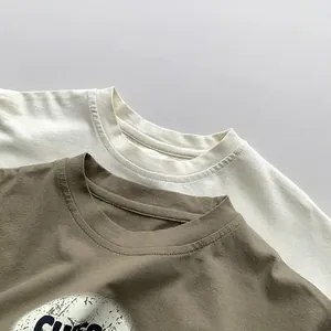 Kids cotton short sleeve T-shirts in cream and dark coffee with ribbed crewneck