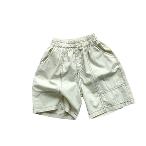 Kinder Freizeithose aus Baumwolle in Beige mit Gummizug und Kontrastnähten Design