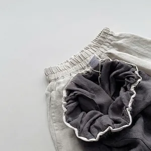 Shorts pour enfants en coton et lin beige et anthracite avec taille élastique souple