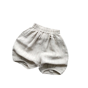 Short bouffant enfant en coton lin beige avec texture rayée et taille élastique