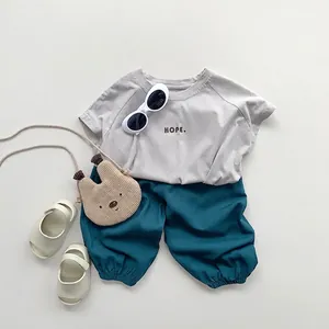 Ensemble t-shirt gris enfant imprimé HOPE et pantalon sarouel vert foncé en coton