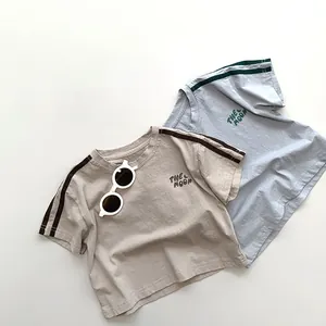 Detail of Korean style cotton kids T-shirts with stripes and The Moon print
