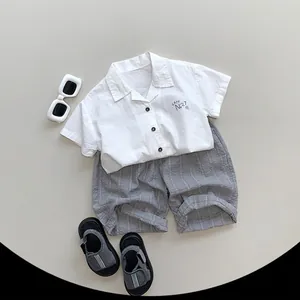 Kids lightweight white cotton shirt and grey striped shorts set for summer fashion