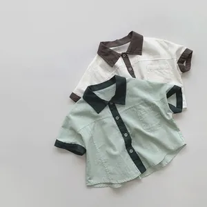 Flat lay of retro color-block cotton linen short sleeve shirts with pocket for kids