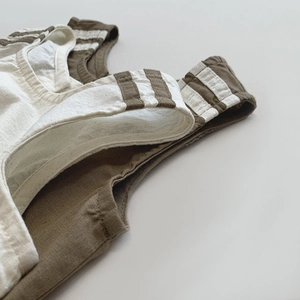Japanese style linen cotton vest for kids with stripe details in cream and olive green