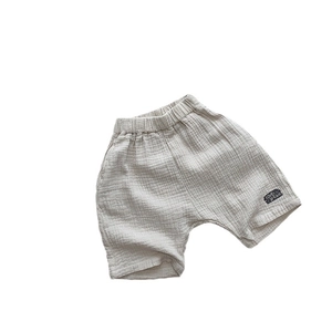 Breathable double-layer cotton gauze baby shorts with elastic waist in light gray color