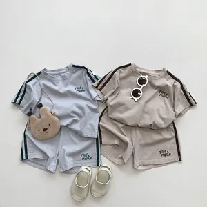 Kids casual short sleeve T-shirt and shorts set with sporty double stripes and MOON logo