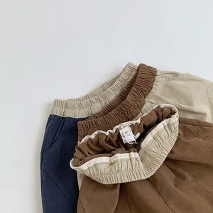 Pantalons en tricot pour enfants en bleu marine, beige et marron avec taille élastique