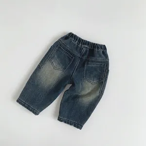Pantalon en jean doublé polaire pour enfant en bleu foncé avec taille élastique souple