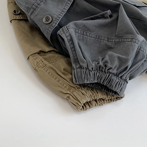 Kids cargo pants in army green and dark grey with elastic cuffs and tactical pockets