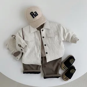 Kids quilted cotton shirt and brown pants set with a cozy fleece cap in cream and earth tones