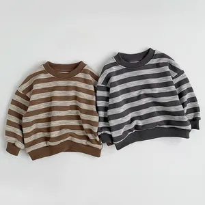 Detailed flat lay of striped fleece sweatshirts with ribbed cuffs and crew necklines