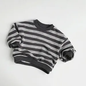 Detailed flat lay of striped grey fleece sweatshirt with ribbed cuffs and crew neck