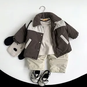 Winter thermal set for children including padded jacket, sweater and pants with puppy bag