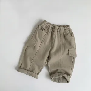 Détails du pantalon cargo enfant kaki doublé polaire avec taille élastique et poches