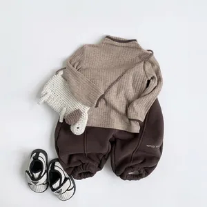 Kids winter thermal knit top and pants set with a brown puppy crossbody bag