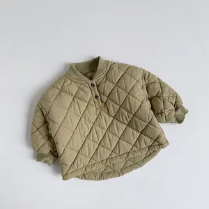 Detail of army green quilted cotton sweatshirt with ribbed collar and diamond stitching