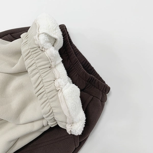 Warm fleece lined winter sweatpants for kids in brown and beige with elastic waist
