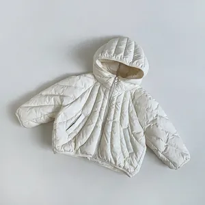 Detail of off-white kids hooded down jacket with curved quilting and zipper closure