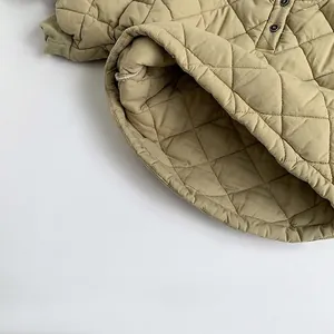 Olive green quilted cotton sweatshirt for kids with ribbed cuffs and round buttons