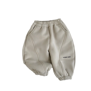 Kids warm fleece joggers in beige cotton with elastic waist and Study Hard print