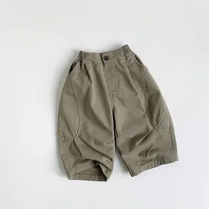 Détail du pantalon large pour enfant en sergé de coton avec taille élastique et poche