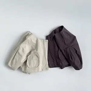 Minimalist cotton jackets for toddlers in beige and charcoal with snap buttons