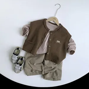 Toddler three-piece spring outfit with brown vest, purple shirt and khaki shorts