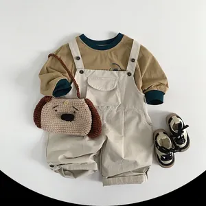 Kids long sleeve yellow T-shirt and white overalls set with knit puppy bag