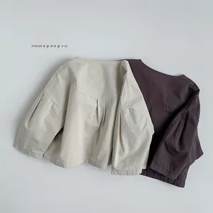 Detail of Korean style kids cotton linen tops in beige and purple with crinkle texture