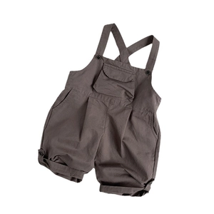 Kids casual cotton overall jumpsuits with criss-cross straps and front flap pockets in brown