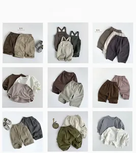 Grille détaillée de chemises et pantalons cargo style japonais pour enfants en coton