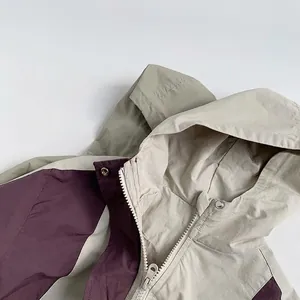 Kids hooded color-block windbreaker jacket in beige and purple with zipper and snap buttons