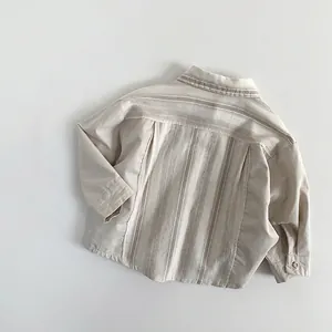 Chemise enfant minimaliste en coton et lin avec patchwork rayé vertical au dos