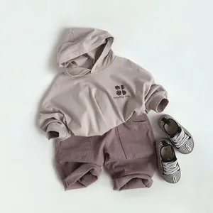 Minimalist kids hoodie and purple cargo shorts set with everything lucky print