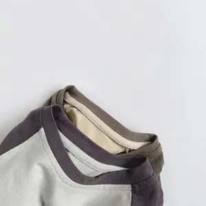Kids long sleeve cotton T-shirt collection in beige and grey patchwork raglan design
