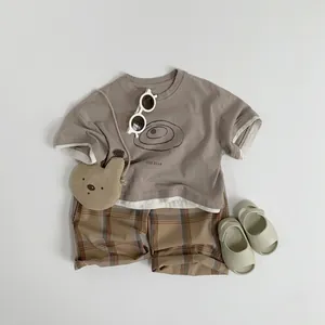 Kids cotton short sleeve T-shirt and plaid shorts outfit set in earth tones