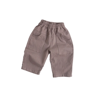 Minimalist kids light brown casual trousers with elastic waist and side pockets