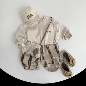 Toddler summer set with beige Maroon t-shirt and striped loose wide-leg trousers