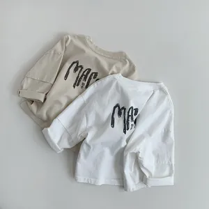 Detailed flat lay of soft cotton children long sleeve T-shirts with MAC print and crew neck