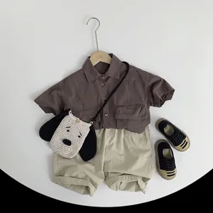 Kids cotton short sleeve utility shirt and shorts set with a dog-shaped crochet bag