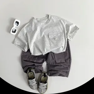 Kids lightweight cotton summer set with grey short sleeve T-shirt and casual cargo pants
