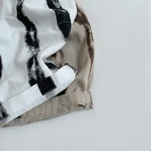 Pantalon large rayé en coton et lin pour enfants avec imprimé artistique style encre